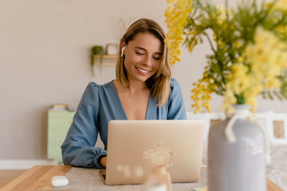 Remote Work Trends: Picture of a female freelancer working from home.