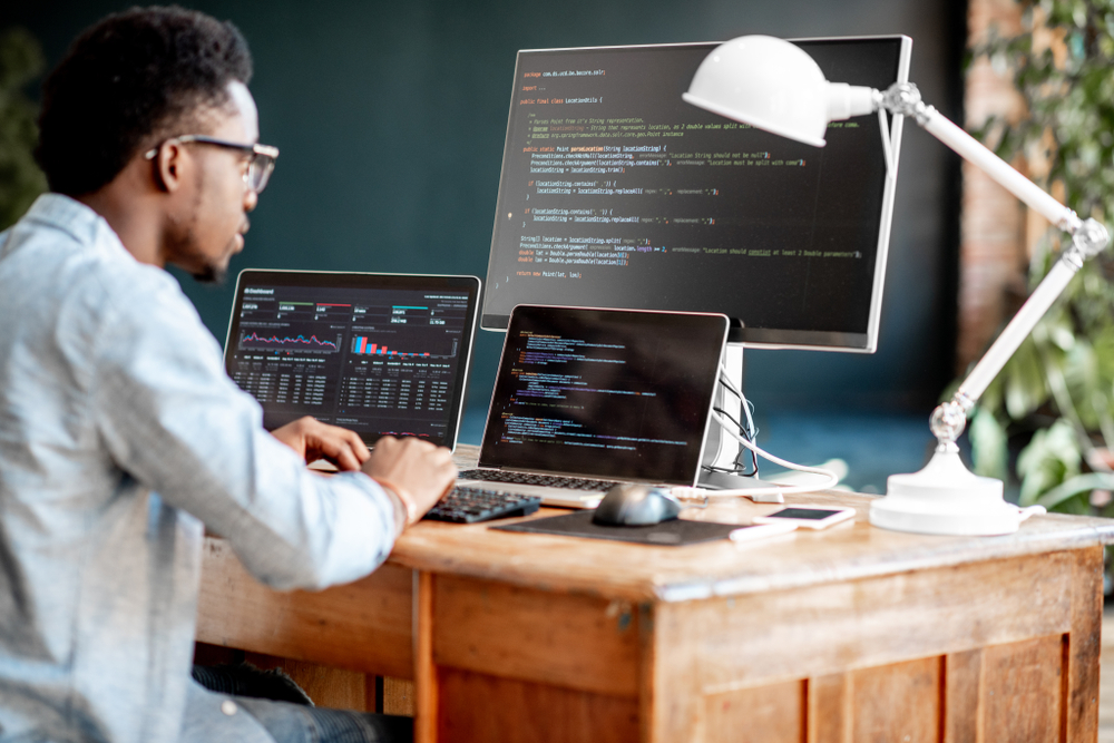 Amazon Remote Jobs: A picture showing a software developer working from home for Amazon.
