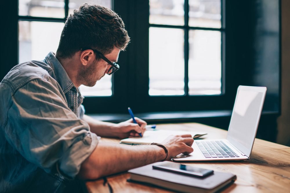 Data Entry Remote Jobs: A young man sitting on his work chair.