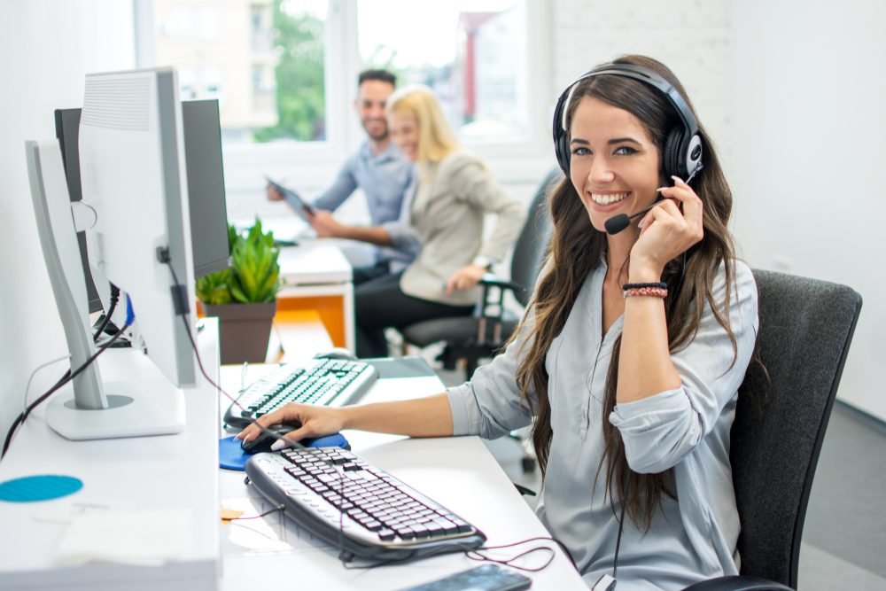 Chat Agent Remote Jobs: Smiling friendly female call center agent