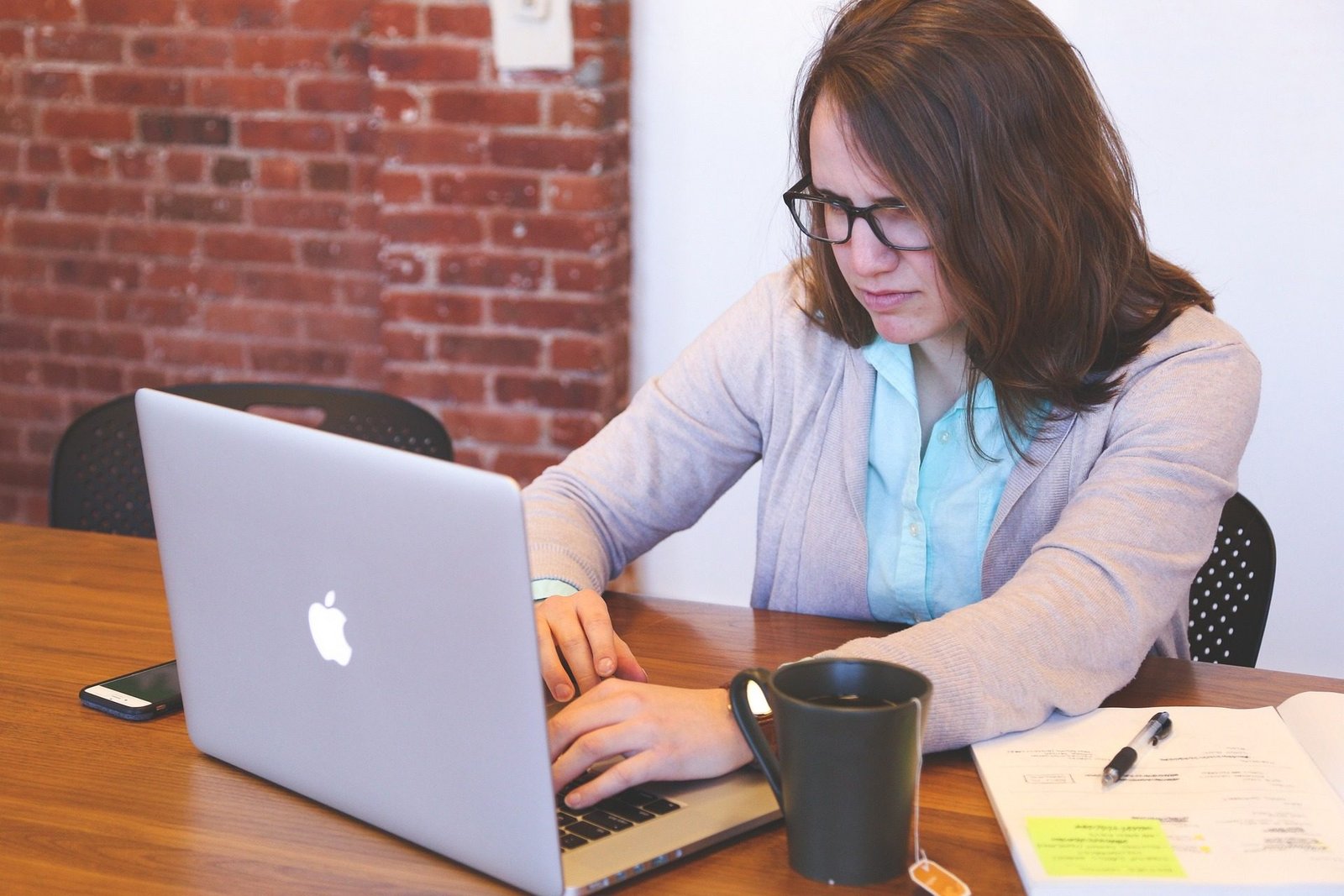 A female student working on the laptop for Online Job Work From Home
