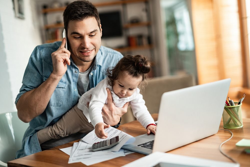 A man and his daughter doing amazon work from home jobs